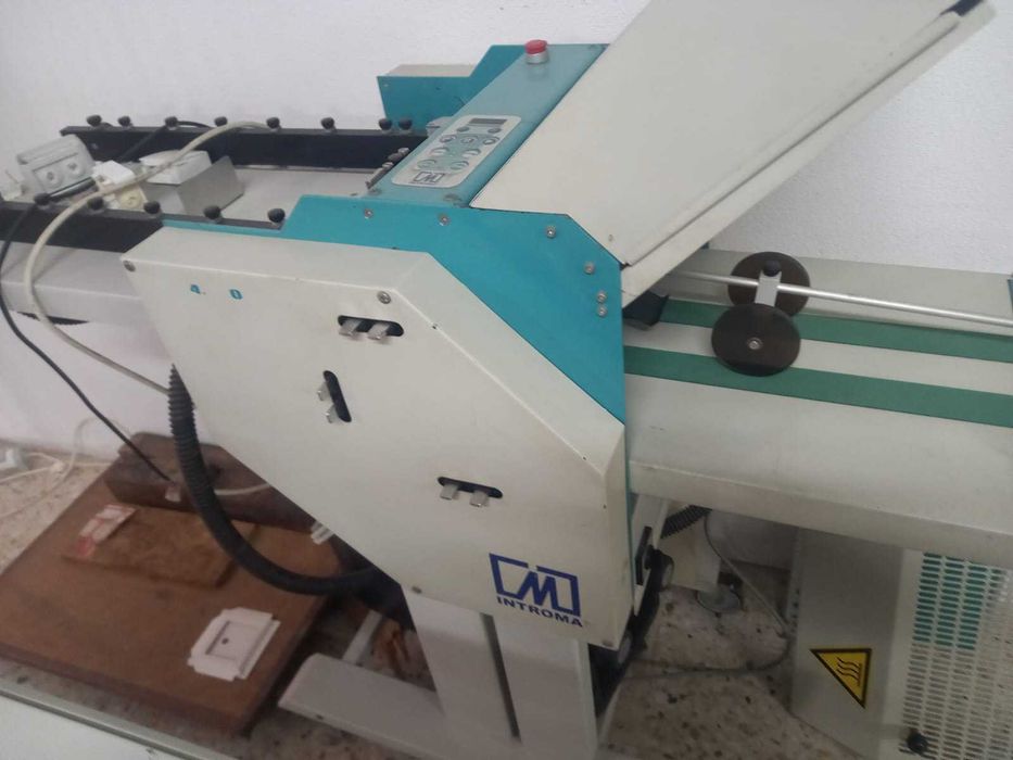 maquina de dobrar papel