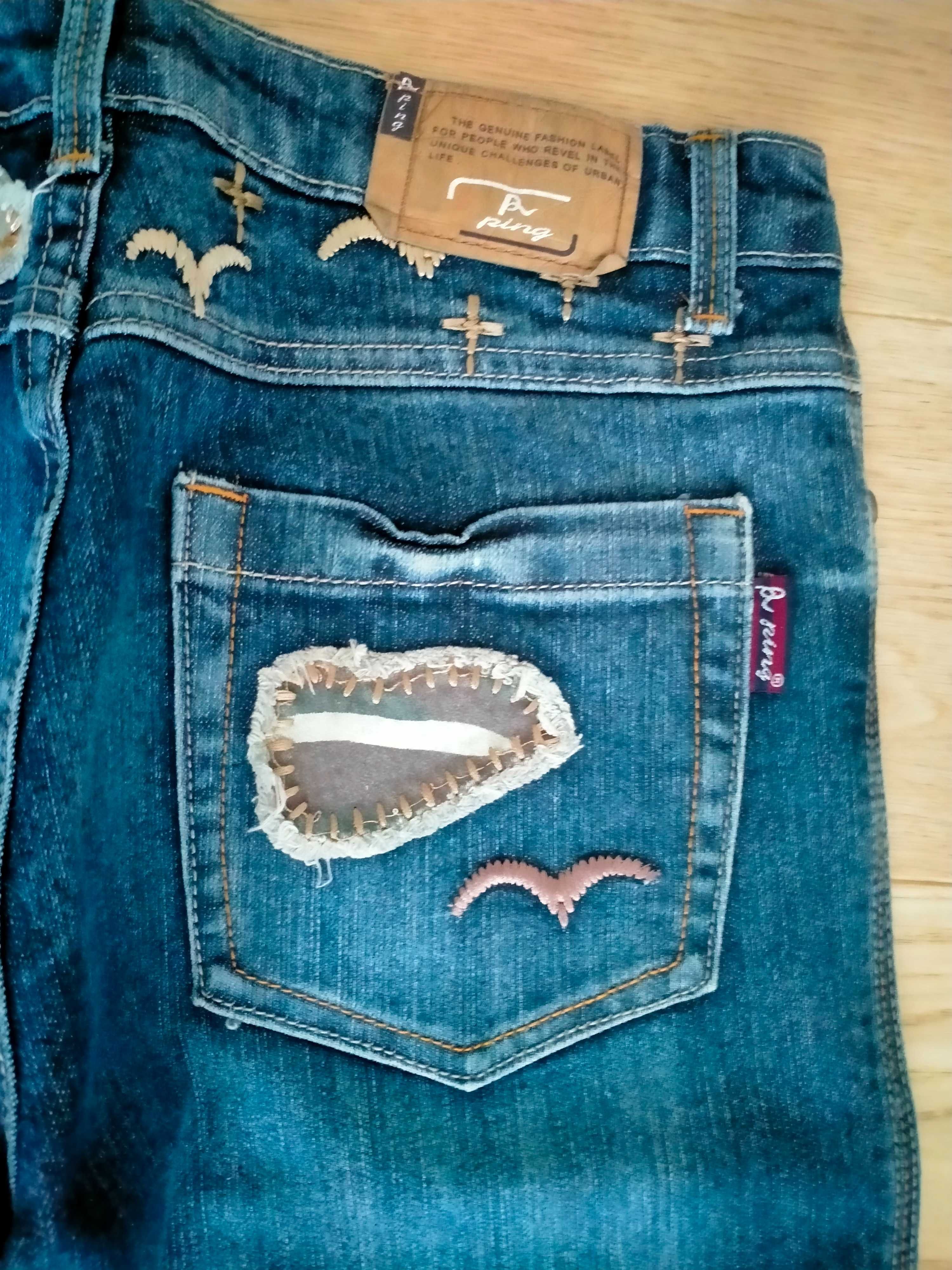 Nowe Spodnie jeans rozmiar 36