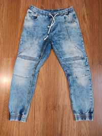 Męskie jeansowe spodnie ze ścigączami