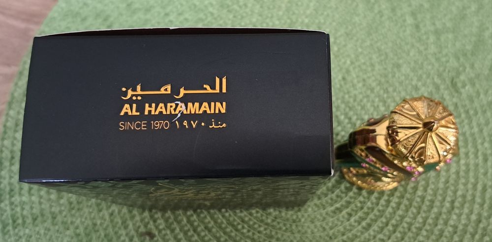 Butelka, flakon po perfumach Haramain Tanasuk