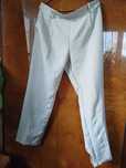 Kremowe eleganckie spodnie marki Coisini w rozmiarze 4 XL