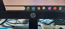 Monitor HP X32c z wykrzywionym ekranem.