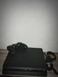 Play station 4 1T + comando e cabos + volante.