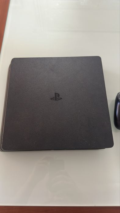 Playstation 4 slim SSD + 2 comandos + jogos