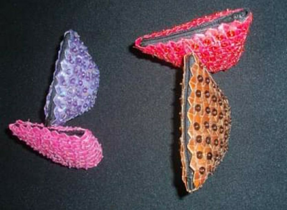 Caixinhas e carteiras em palha