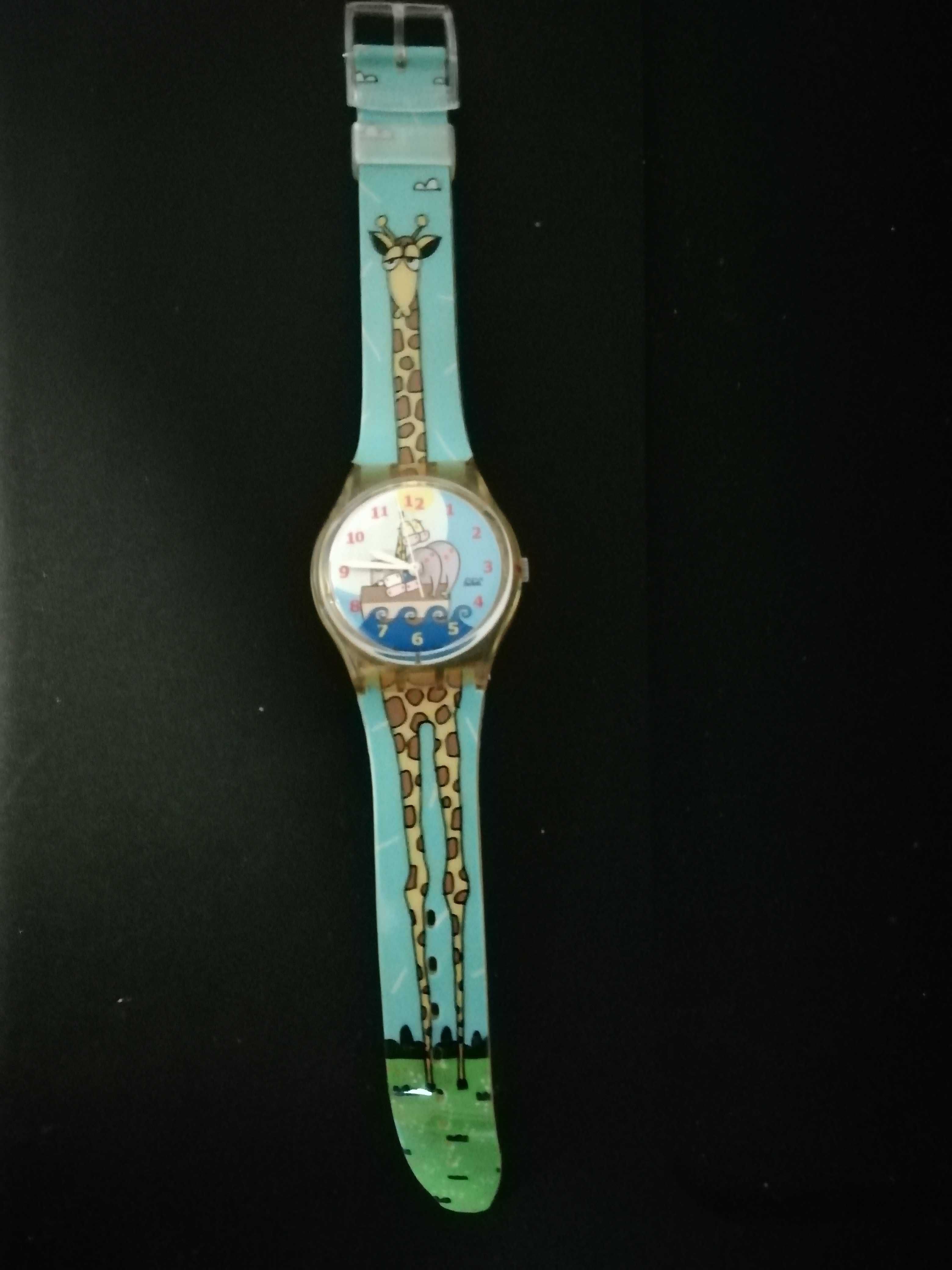 Relógio swatch	Fundo arca de Noé e bracelete com girafa. Como Novo !!