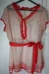 Blusa com top e cinto