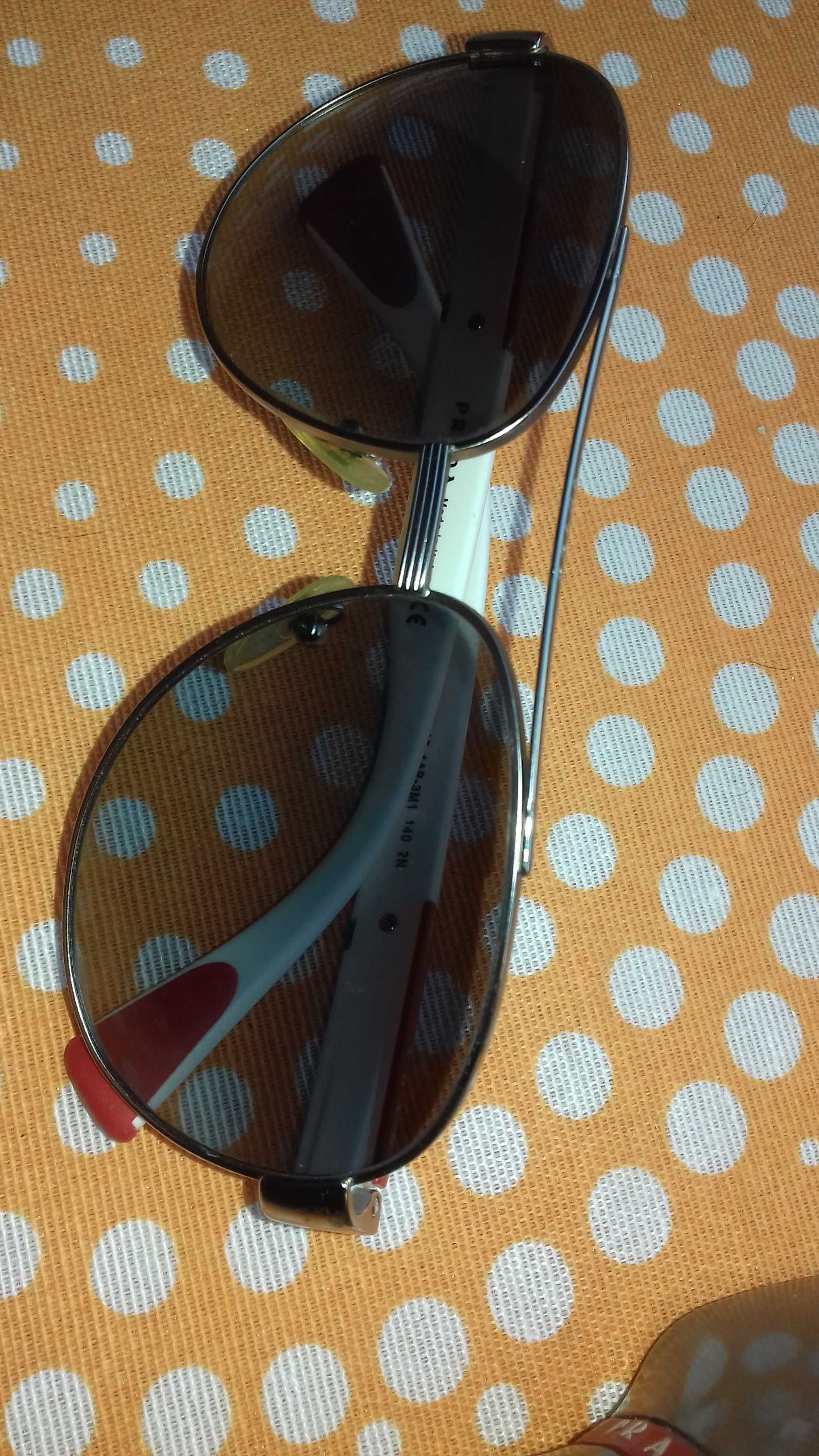 oculos sol Prada made italia / verdadeiros armação aviador