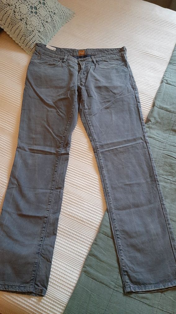 Spodnie , dżinsy firmy Hugo Boss, Orange 24 Barcelona. Szaro niebieski