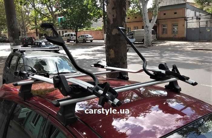 Нове вітринне велокріплення на дах THULE Freeride 532 Proride 598