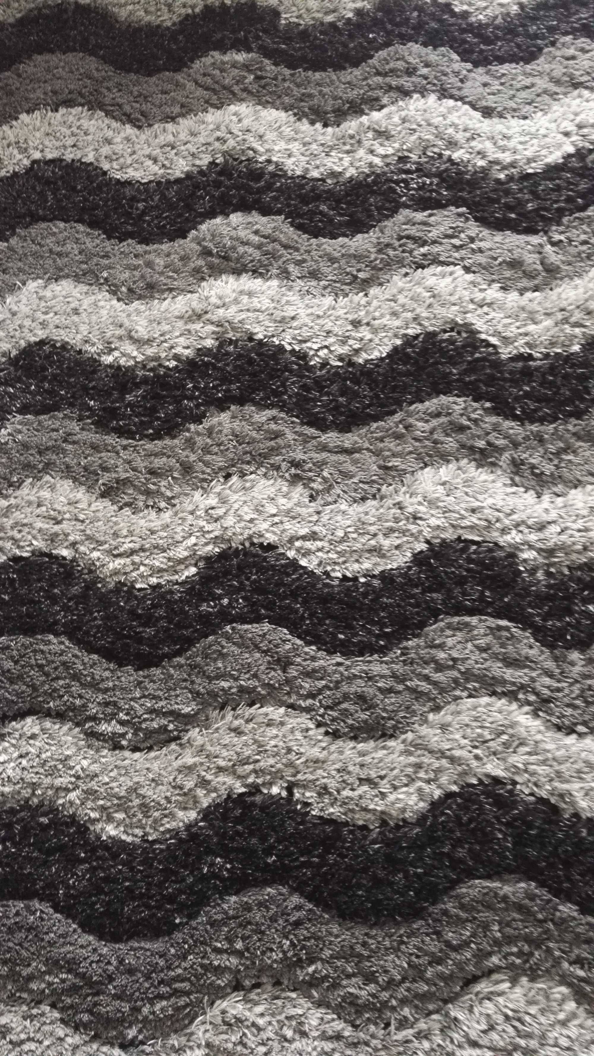 Duzy dywan o wym.140/200