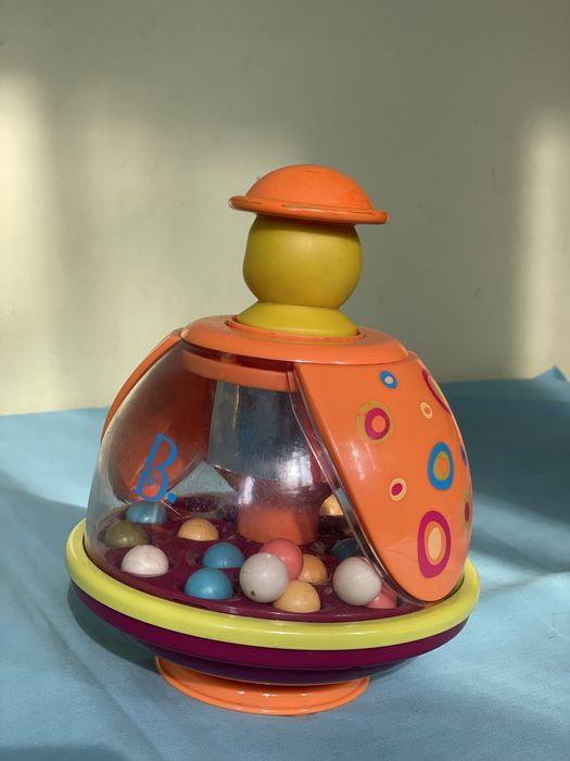 Розвиваюча іграшка, игрушка Battat Юла-мандаринка