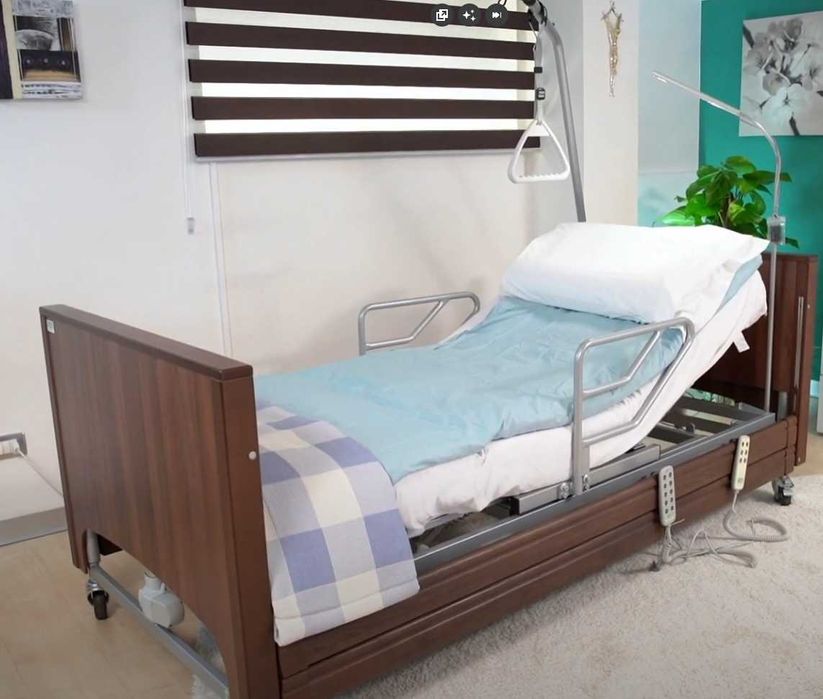 Łóżko rehabilitacyjne Gamareha TWIST z funkcją pionizacji JAK NOWE