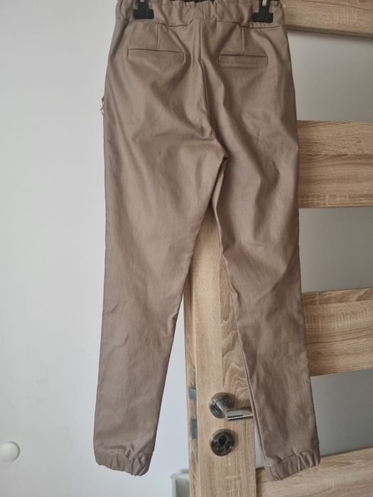 Spodnie woskowane Xana r.36/38, S, M piekny łancuch