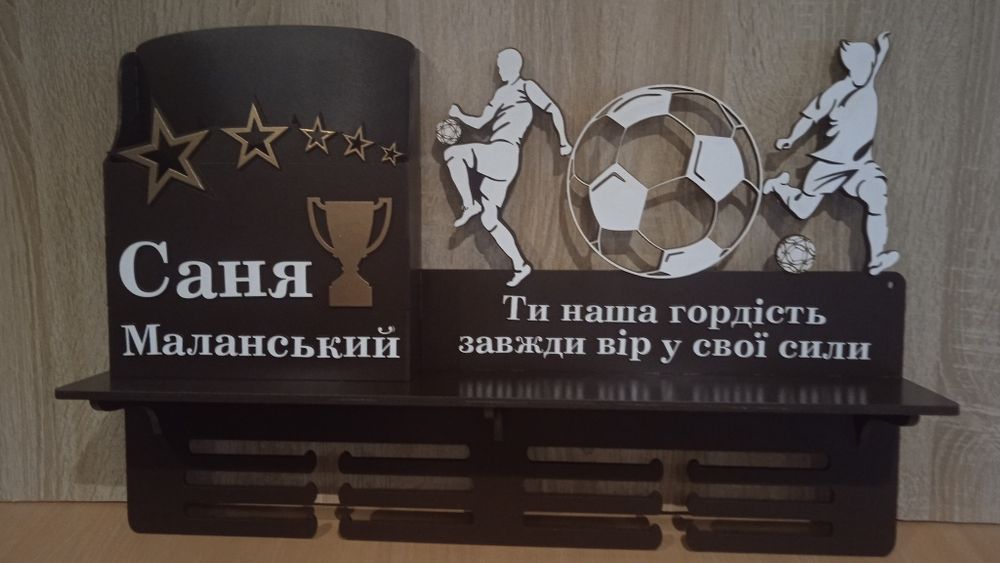 Медальниця по футболу