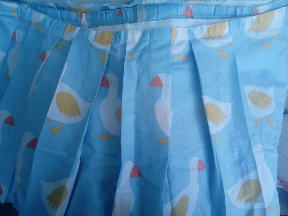 Cortinados azuis com patinhos