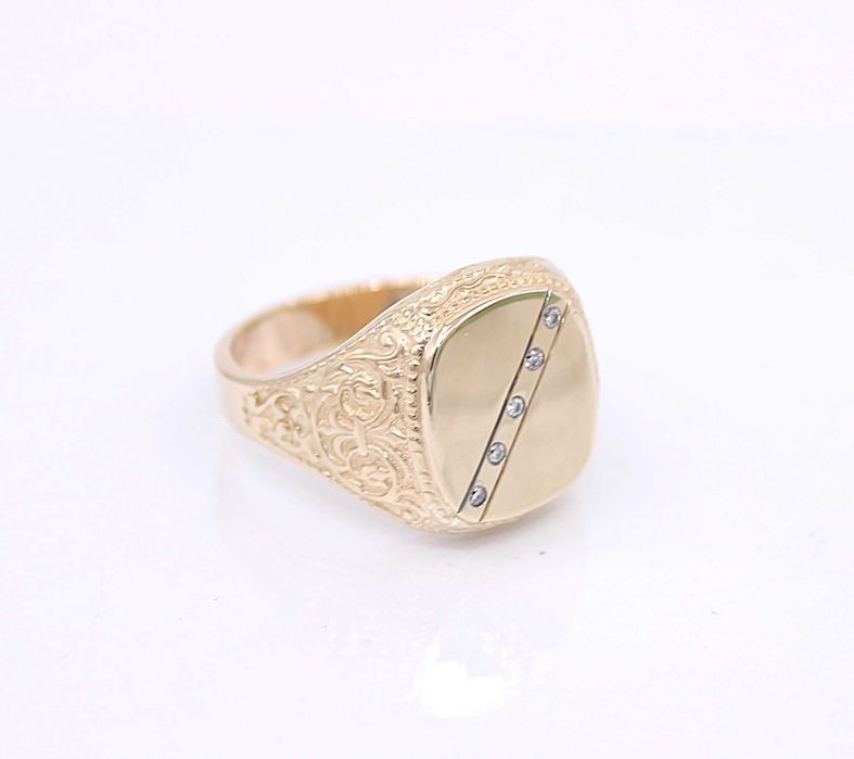 Złoty sygnet p.585/15,38g z brylantami