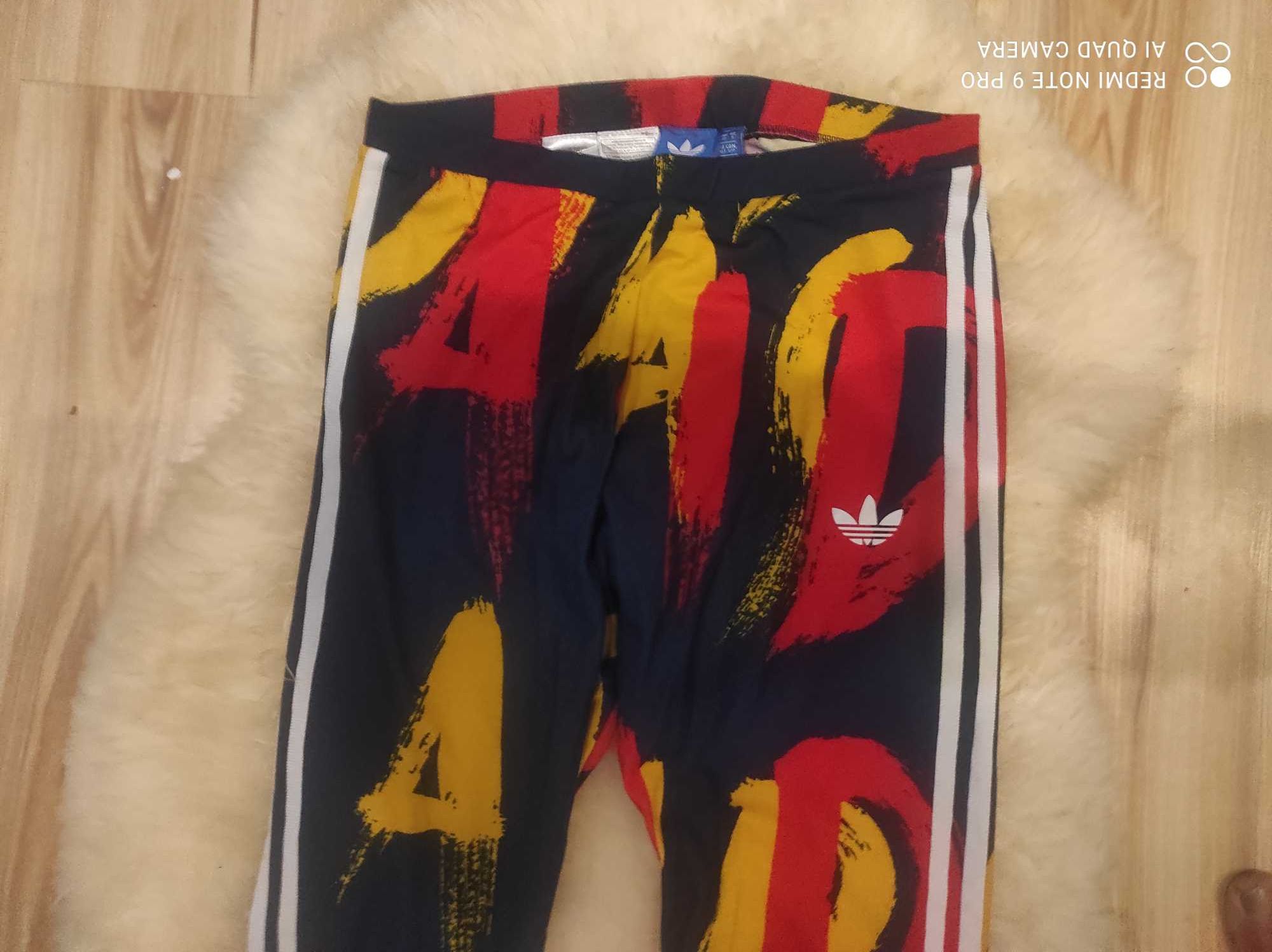 Kolorowe długie legginsy adidas S 36