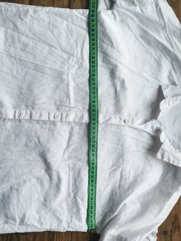 Biała koszula z falbanką Reservet r. 152 cm