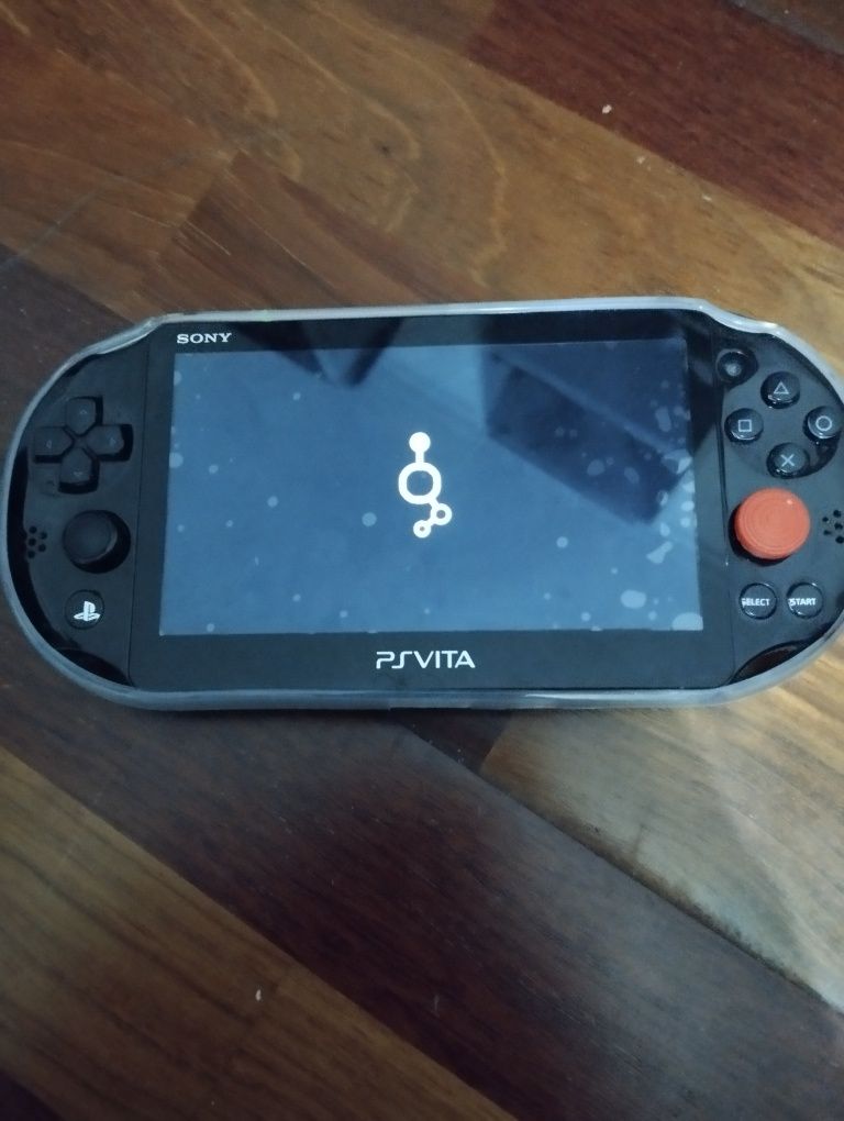 PS vita slim com acessórios e jogos