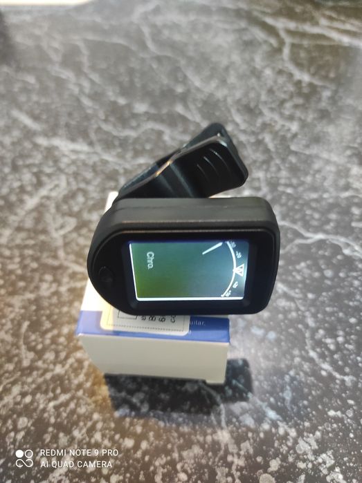 Тюнер для настройки гитары