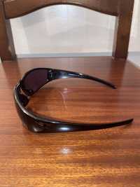 Oculos de sol pretos usados