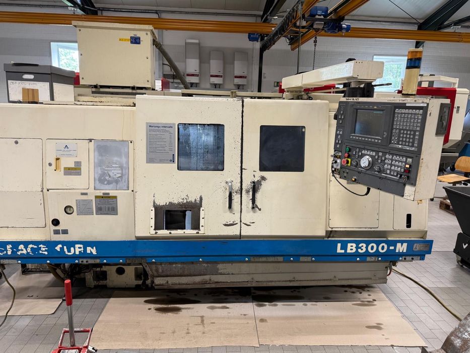 Токарно-фрезерний верстат (токарный станок) Okuma LB300M