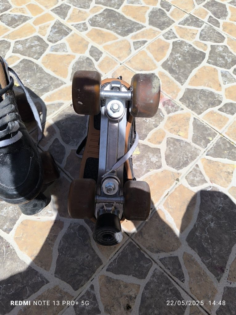 Patins de quatro rodas