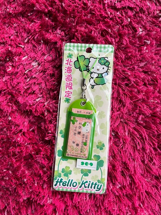 Hello Kitty Sanrio breloczek medalion na szczęście koniczyna
