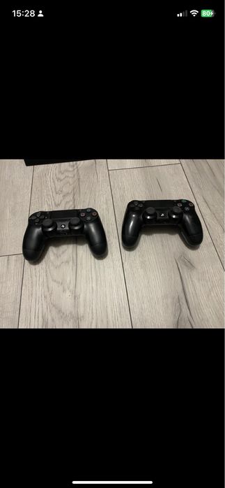 Ps4 pro z kablami , grami i stacja dokujaca