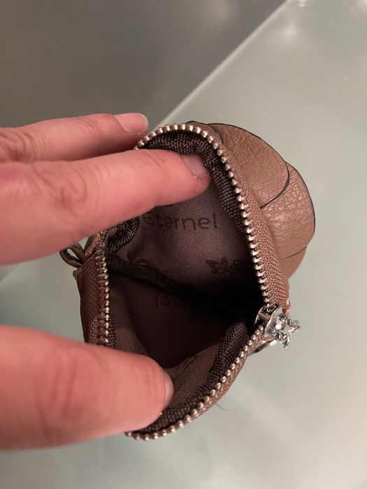 Porta moedas,crianca e senhora