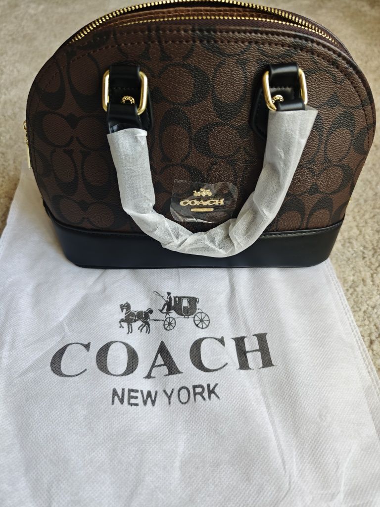 Mala Coach nova na caixa