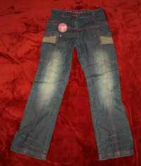 WÓJCIK PARADISE Spodnie jeans dziewczęce z haftem Model różowy R 146