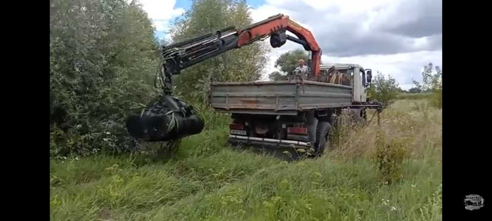 Очистка водоема краном манипулятором с грейфером, очищення ставка