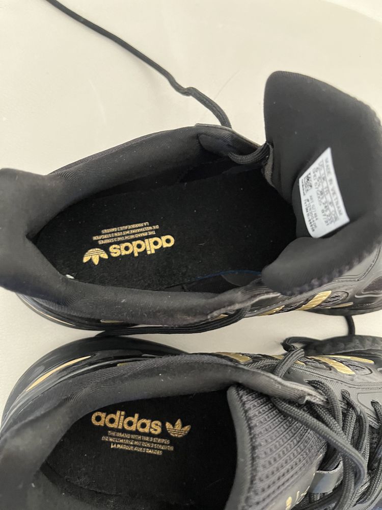 Adidas pretos e dourado ZX 2K Boost 2.0