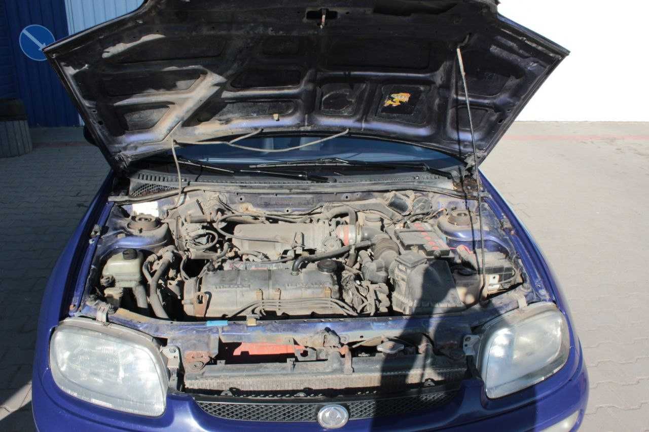 Мазда 323 f Mazda 323 BA f 1/3 газ бензин