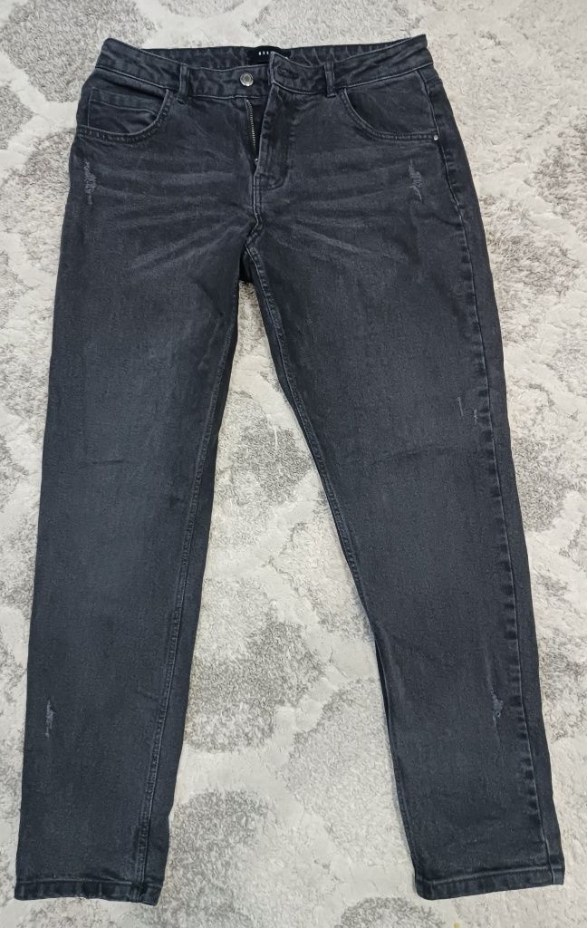 Spodnie jeans denim Mohito roz. 38