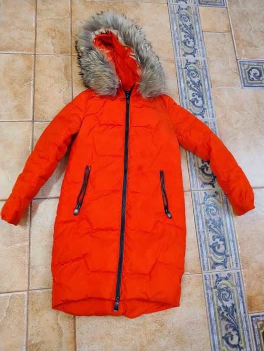 Продам пуховик теплий