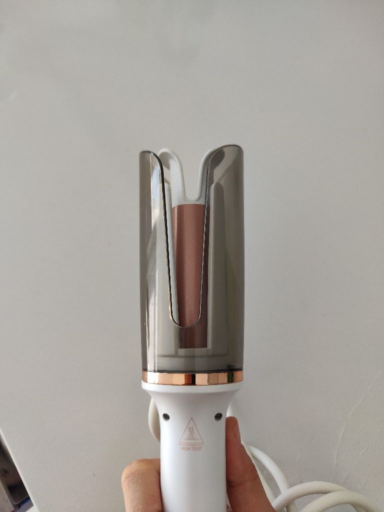 Modelador de cabelo automático