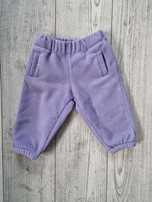 Spodnie niemowlęce polarowe z szeroką gumką kolor lilac ok6mcy