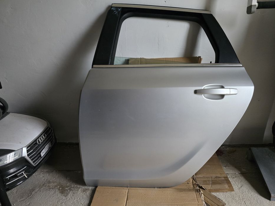 Dzwi Opel Astra J Kombi Lewy Tyl