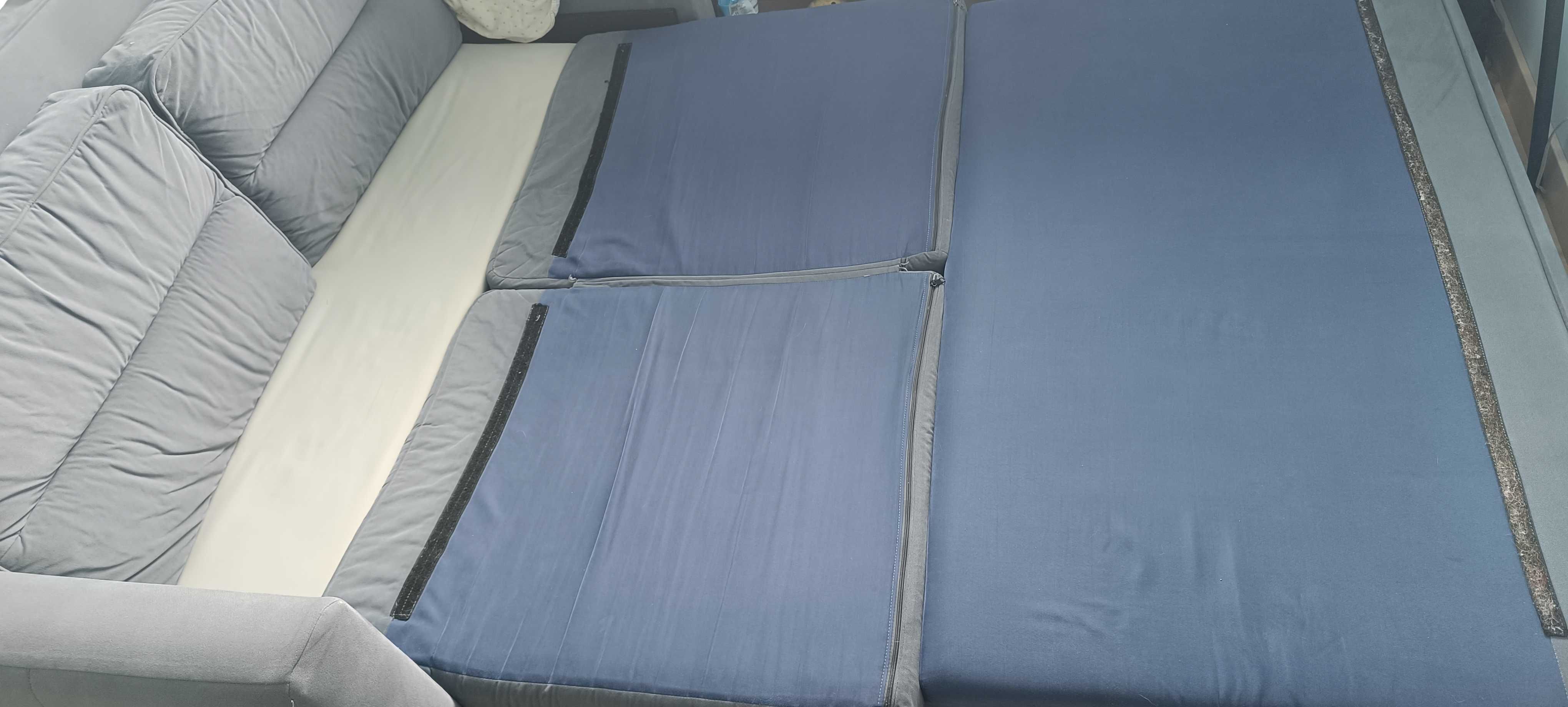 Tapczan, kanapa, sofa w kolorze szarym. Pojemnik.