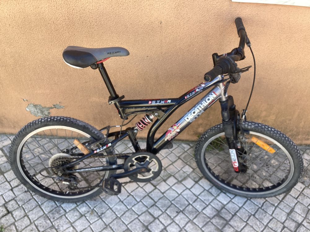 Bicicleta como nova com amortecedores a frente