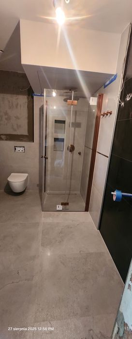 Usługi glazurnicze , usługi hydrauliczne , montaż paneli ,