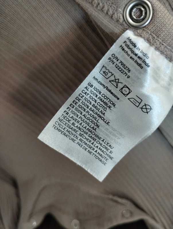 Beżowy kombinezon H&M z regulacją rozmiaru, r. 74 (6-9 msc) rozpinany