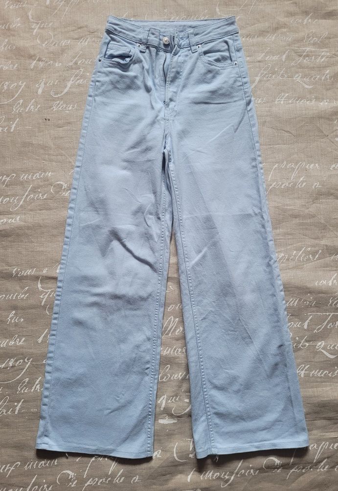 Niebieskie blekitne szerokie proste luzne jeansowe spodnie 34 XS