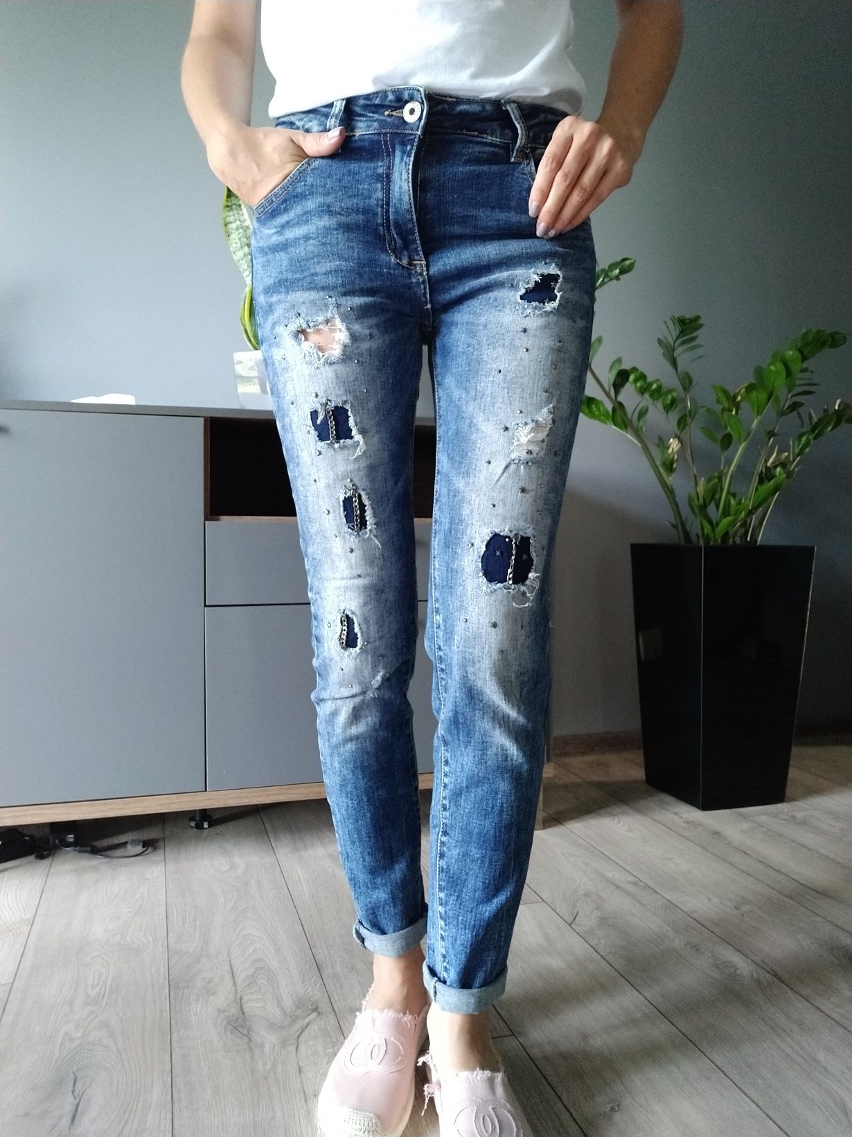 Nowe jeansy z przetarciami 38/M