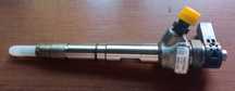 Wtryskiwacz wtrysk 04L130277AC 2.0 TDI VW Audi Seat Skoda