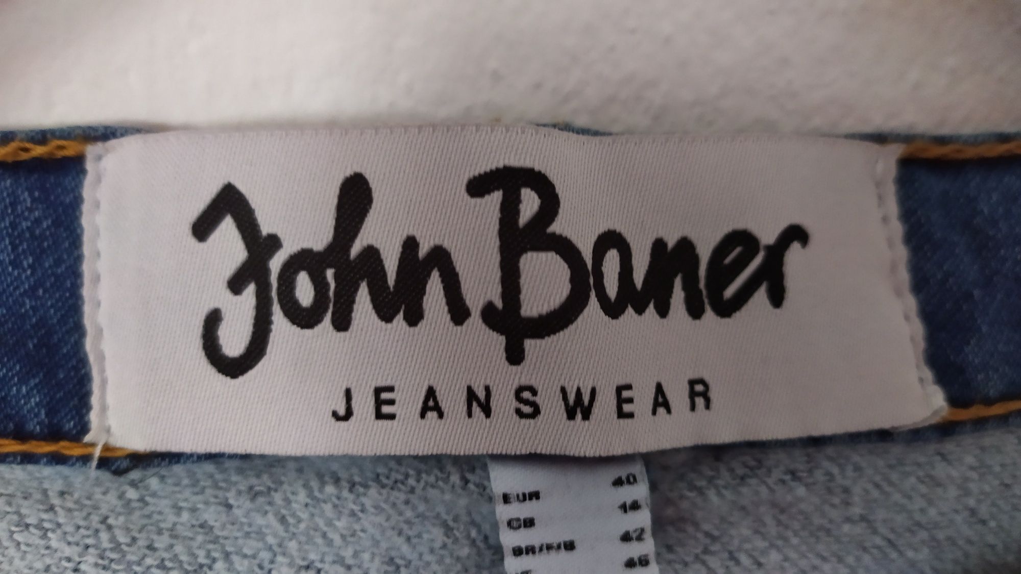 JOHN BANER nowe jeansy rurki z elastanem r. 40