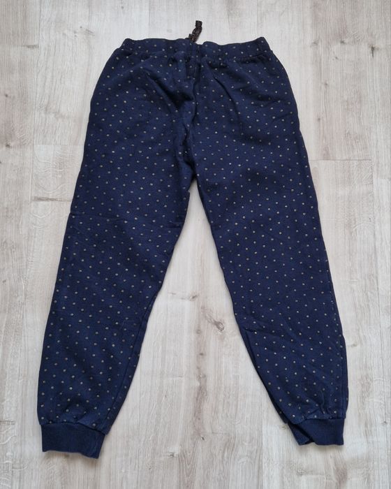 Spodnie dresowe w kropki 128